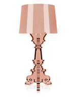 Lampe Bourgie métallisée cuivre de Kartell, disponible chez I.D DECO et en livraison partout en France