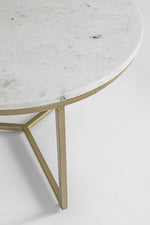 Table basse marbre blanc avec pied en acier peint chez I.D DECO Marseille, boutique de décoration et d'ameublement
